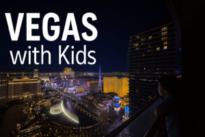 Child overlooking the Las Vegas Strip at night – perfect for exploring things to do in Las Vegas with kids