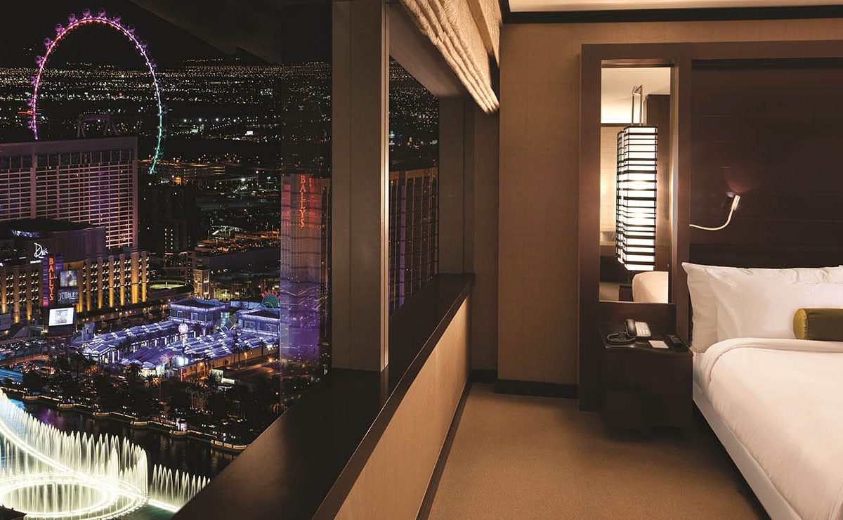 Luxury Las Vegas hotel room with a view of the Strip at night
